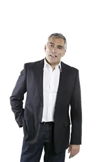 Senior businessman portrait black suit gray hair over white background