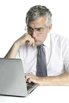 Senior businessmen focused on laptop work computer white background