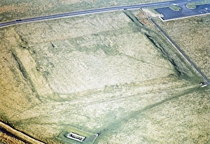 Series of oblique aerial photographs of sites associated with Hadrian's Wall, c. 1970s Roman fort Carrawburgh, Northumberland, England, United Kingdom from the south