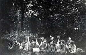 Seven young women in the meadow