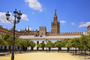 Seville cathedral Giralda tower from Alcazar of Sevilla Andalusia Spain