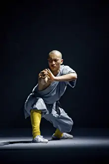 Shaolin monk concentrating to gather energy