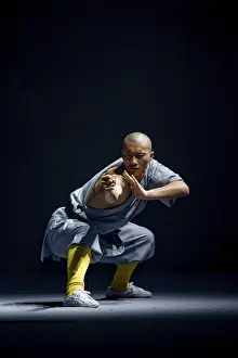 Shaolin monk concentrating to gather energy