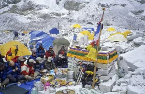 Sherpas and climbers at a Puja ceremony for the goddess Miyo Langsangma