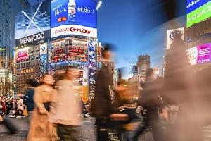 Shibuya Crossing, crowds of people at crossroads