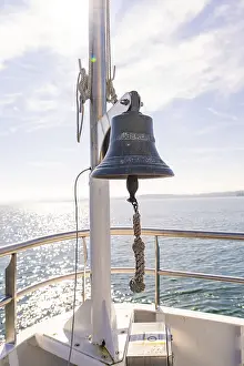 Ship bell on the bow of a boat