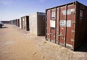 Shipping container with equipment in a storage facility for oil drilling, Dhahran, Arabian Desert, Saudi Arabia 19789