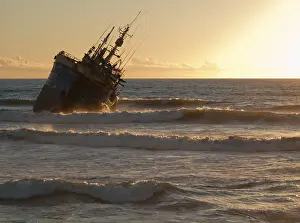 Shipwreck at sunset at Laayoune Plage
