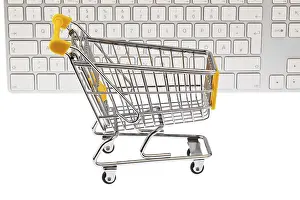 A shopping trolley and computer keyboard