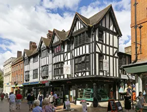 Shops and shoppers, mock Tudor half timbered buildings in town centre