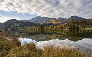On the shore of Lake Lake Kochel with reflection