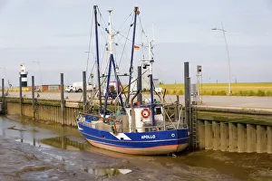 Shrimp trawlers moored in the sieve harbour on the Wadden Sea