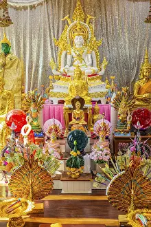 Shrine with gilded Buddha statues