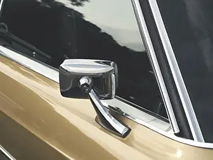 Sideview mirror of an old vintage car
