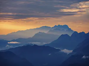 Silhouette of the Hoher Dachstein in the haze at dawn