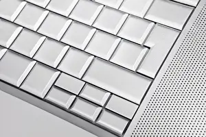 Silver keyboard detail with empty buttons