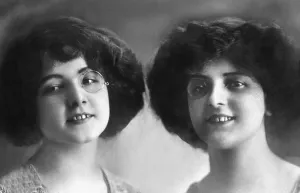 Sisters, twins with monocle, 1910s