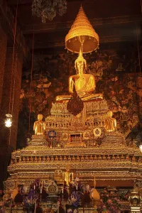 Sitting Buddha Gold Statue in Buddhist Temple