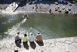 Sitting people at the harbour, Clovelly, North Devon, England, Great Britain September 1968