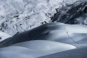 Ski mountaineers in winter landscape