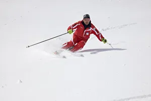 Skier skiing in deep snow, Alta