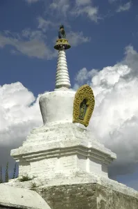 Sky with clouds above Buddhist monastery tower stupa