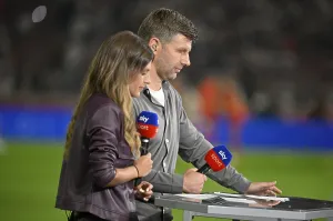 SKY presenter Mara Mones in an interview Microphone Logo with TV expert Thomas Hitzlsperger German Football League