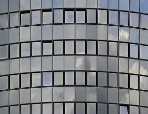 The sky is reflected in a modern