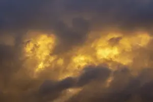 Sky with Stormy Dark Clouds at Sunset