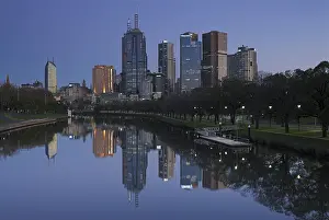 Skyline of Melbourne and its reflection in the Yarra River before sunrise
