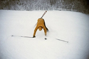 Slalom 1978. A man going dowhill on slalom skis caught by the camera in the moment he has lost his balance and is about to fall in a spectacular way