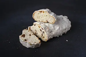 Slices of fruit bread on a dark background