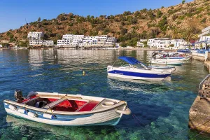 Small boats in front of Loutro, Crete, Greece