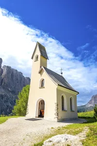 Small church with a bell tower near the gardena pass