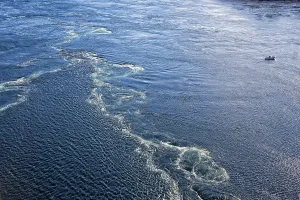 Category Scandinavia Prints: Small fishing boat near a dangerous whirlpool