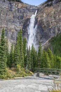 Small footbridge across the turbulent river