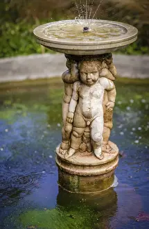 Small fountain in the Rookery in Streatham Common Park in London