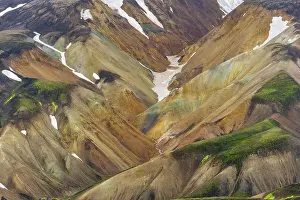 Small river between colourful rhyolite mountains