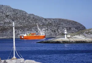 Small Seatrans cargo ship in coastal waters, Norway 1980