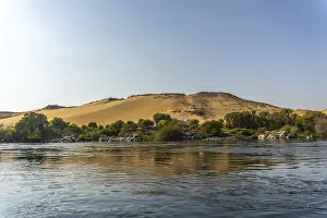 Small towns and ancient temples navigating the Nile River in Aswan city