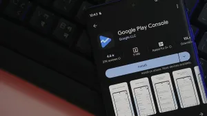 Smartphone displaying Google Play Console app interface
