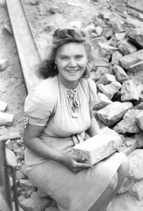 Smiling Debris Woman with Stone, ca