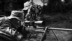 Sniper together with the gunner took the position and expect the target