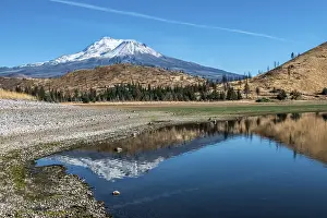 Framed Print : Snow capped mount shasta with a blue sky and reflection in lake Framed Print : Snow capped mount shasta with a blue sky and reflection in lake