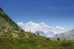 Snow-capped Mountain and Clouds and Blue Sky in Valais