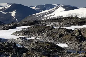 Snow-capped mountains and rocky landscape at Dalsnibba