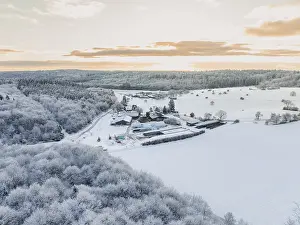 Snow-covered hills and forests