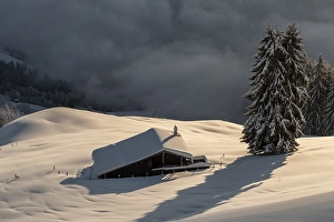 Category Mountain Landscapes Prints: Snow-covered hut in the morning sun