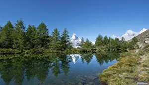 Snow-covered Matterhorn reflected in the lake