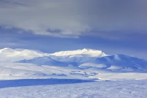 Snow covered mountains in Arctic landscape at Mohnbukta
